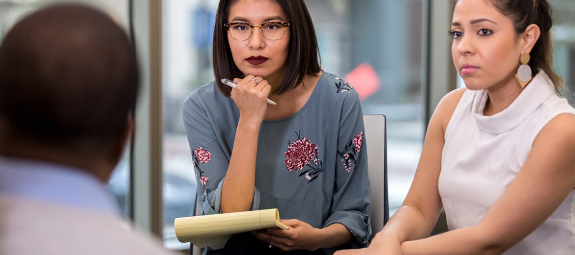 3-people-serious-discussion-istock-1142260797