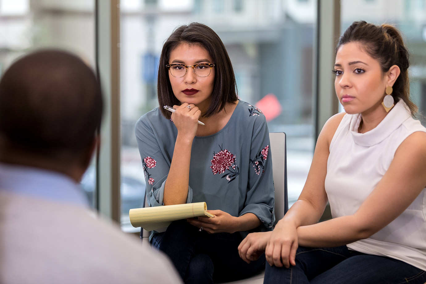 3-people-serious-discussion-istock-1142260797